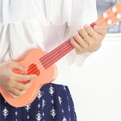 Epik Musik-Erleuchtungs-Gitarrenspielzeug Für Kinder Bildung Simulation Ukulele-Kindermusikinstrument 2 Epik Musik-Erleuchtungs-Gitarrenspielzeug Für Kinder Bildung Simulation Ukulele-Kindermusikinstrument – Bild 2